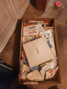lot 136 image: Box full of clothing patterns