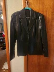 lot 133 image: Black leather jacket by Valerie Stevens - M