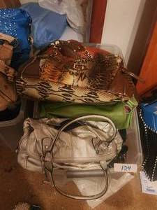 lot 124 image: Bin full of purses