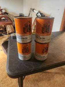 lot 81 image: Selection of 4 vintage Harley Davidson oil cans - full