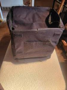 lot 54 image: Rolling canvas case