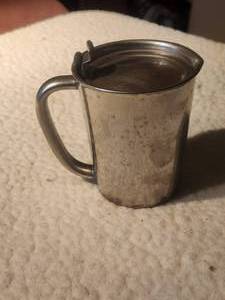 lot 33 image: Stainless steel Vollrath creamer