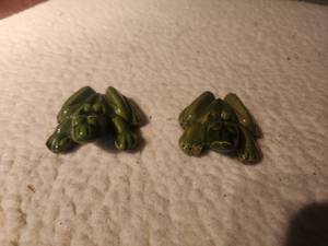 lot 10 image: Pair of vintage naughty frogs