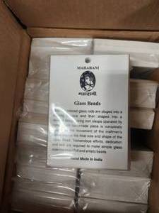 lot 108 image: Box of glass bead story cards
