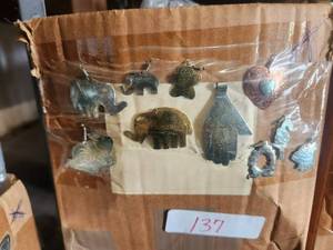 lot 137 image: Generous selection of metal pendants and charms for jewelry and craft making
