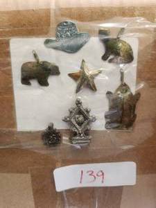 lot 139 image: Generous selection of metal pendants and charms for jewelry and craft making