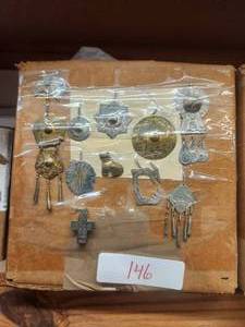 lot 146 image: Generous selection of metal pendants and charms for jewelry and craft making