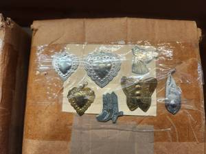 lot 143 image: Generous selection of metal pendants and charms for jewelry and craft making
