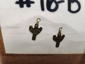 lot 203 image: Generous selection of metal pendants and charms for jewelry and craft making