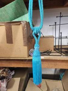 lot 249 image: Box of blue tasseled curtain tiebacks