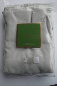 lot 14 image: Kate Spade Cotton  Polyester Tablecloth, About 70 x 122, Platinum Color.