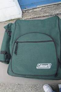 lot 62 image: Coleman Backpack Style Wine Picnic Kit With Cool Pack Side. Includes 4-Each Plastic Plates, Wine Cups, Corkscrew And More.