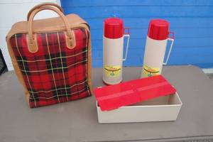 lot 64 image: Leather And Canvas Themos Lunch Kit Including 2-Large Quart Thermos Bottles And Dry Food Tray.