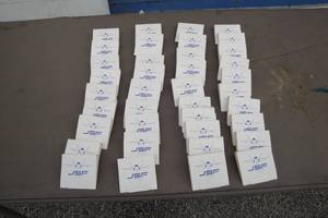 lot 65 image: Lot Of 38- Matchbook Style Packs Of 4- JSF (Joint Strike Fighter) White Golf Tees. 4-Per Pack. And Ball Marker