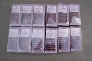 lot 72 image: Lot-12-Boxes Of Shower Curtain Rings, Plum Color