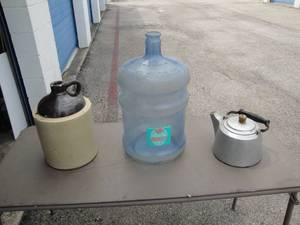 lot 105 image: Mixed Lot- Water Cooler, Plastic Jug, Stoneware Jug, And Aluminum Covered Stoneware Kettle