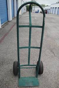 lot 119 image: Green 2-Wheel Dolly With Pneumatic Tires That may need air or repair.