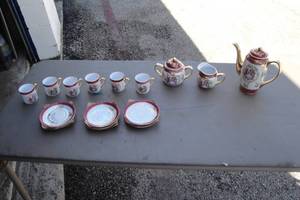 lot 167 image: China Tea Set Including Tea Pot With Lid, Creamer, Sugar With Lid, 6-Cups And 6-Saucers