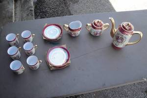lot 170 image: China Tea Set Including Tea Pot With Lid, Creamer, Sugar With Lid, 6-Cups And 6-Saucers