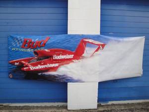 lot 217 image: Budweiser Hydroplane, Bernie Little Miss Budweiser U-12 Boat Banner, About 116 x 36