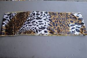 lot 159 image: Lot Of About 60- 8-Foot Long X 8-In. Wide Leopard Like Print Tabe Runners.