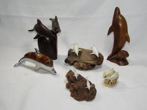 lot 287 image: John perry dolphin figures and rosewood carved dolphins