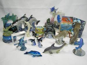 lot 289 image: Assorted dolphin figures as shown