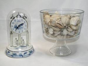 lot 294 image: Waltham dolphin theme anniversary clock and glass compote with seashells