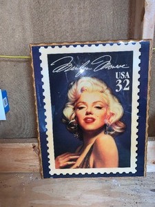 lot 87 image: Marylin Monroe wooden wall decor     see pics