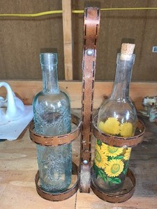 lot 108 image: 2 wine bottles and holder   see pics