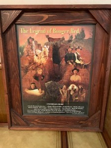 lot 10 image: Wall decor - The Legend of Booger Red - autographed