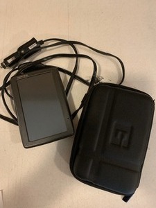 lot 31 image: Tom-Tom GPS with case and GPS dashboard friction mount