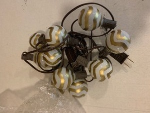 lot 32 image: Glass white balls with gold zig-zag  UL.SL - 10 count