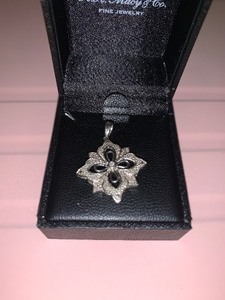 lot 37 image: Diamond and sterling silver pendant