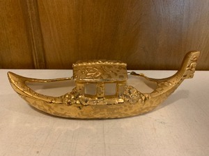 lot 51 image: Weeping gold drip gondola candy boat