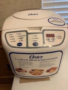 lot 68 image: Oster 2 pound deluxe bread and dough maker