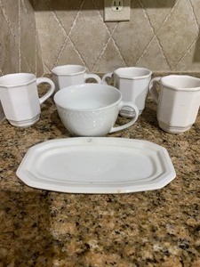 lot 77 image: Misc kitchen coffee cups and butter dish