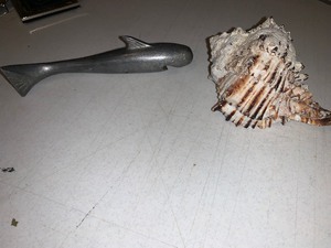 lot 112 image: Pewter shark bottle opener and seashell