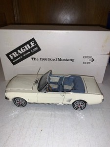 lot 164 image: Model 1966 Ford Mustang die-cast car Danbury Mint in box