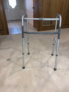 lot 199 image: Adjustable aluminum medical walker in good shape