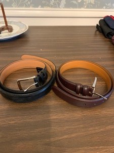 lot 219 image: 2 mens genuine leather belts - 1 black and 1 brown - Black is Tommy Hilfiger (40 waist) Brown one is Ralph Loren Polo (38 waist)