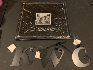 lot 280 image: Photo album and 3 metal letters K, W, C with tags - see pics