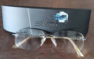 lot 12 image: Really Nice Pair of Silhouette Rimless Eyeglasses with Case