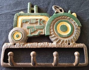 lot 32 image: Vintage Cast Iron Tractor Key Holder