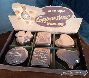 lot 38 image: Complete Set of 6 Aluminum Copper Tone Gelatin Molds with Original Box Display
