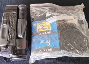lot 48 image: Vintage Nikon VN750 Video Camcorder with Bag of Accessories