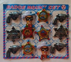 lot 69 image: Lone Ranger Badge Set--Japanese Tin Litho--Complete and new