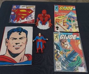 lot 91 image: Superman Book, Patch and Bendems Figure with Spiderman Coin Bank and 2 GI Joe Comic Books