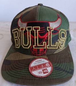 lot 124 image: 9 Fifty Chicago Bulls Hardwood Classics Camo Snapback Ball Cap---Needs to be cleaned