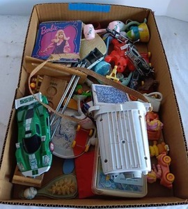 lot 110 image: Selection of Random Toys Including Hess Car, Spurs Motorcycle, and Barbie Calendar